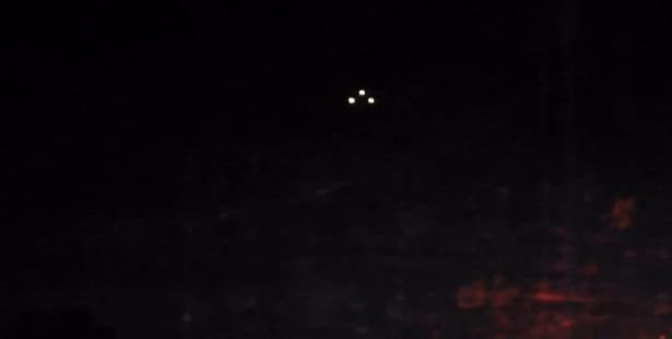 Mysterious footage has emerged of a bizarre triangular UFO 
