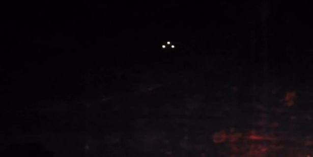 Mysterious footage has emerged of a bizarre triangular UFO 