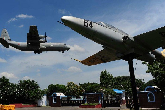 A C-130 returns after a failed mission to trace the missing AN-32