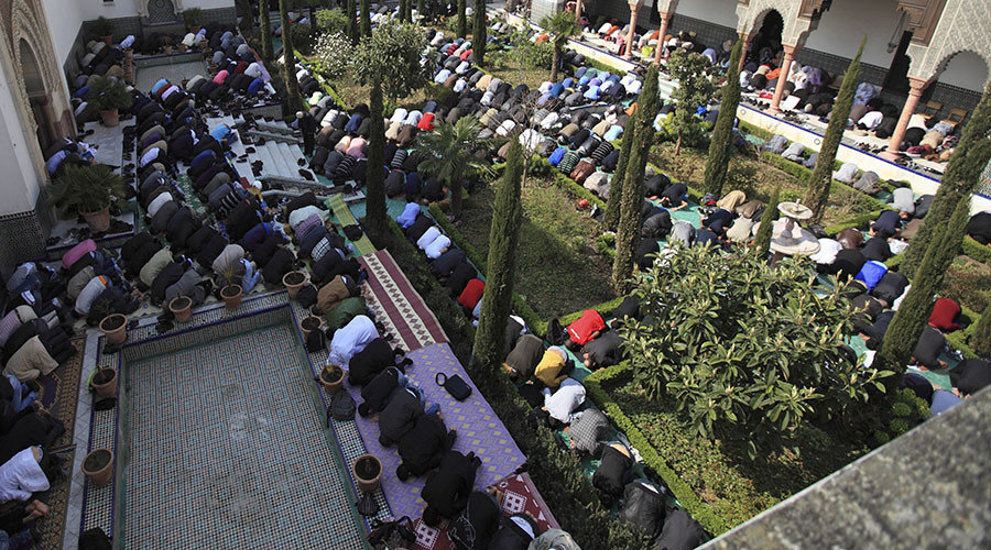 Muslims pray at a mosque in Paris