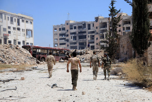 Syrian army soldiers patrol Aleppo