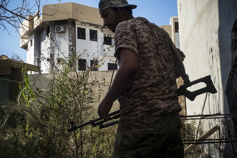 Click to enlarge A fighter from the pro-government forces on the front line in Sirte, Libya