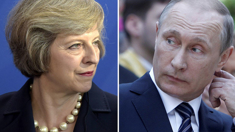 British Prime Minister Theresa May (L), Russian President Vladimir Putin