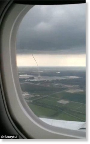 The tornado swirled over Council Bluffs, Iowa, on Thursday and could be seen from Omaha, Nebraska, on the other side of the Missouri River