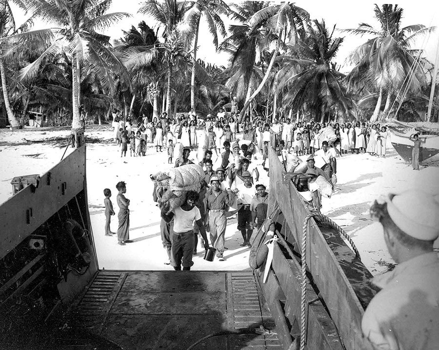 Click to enlarge Bikini Natives going aboard LCM