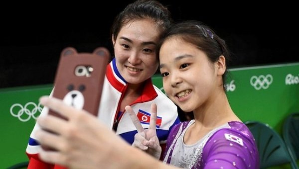 North and South Korean gymnasts competing at the Rio Olympics posed for a selfie together