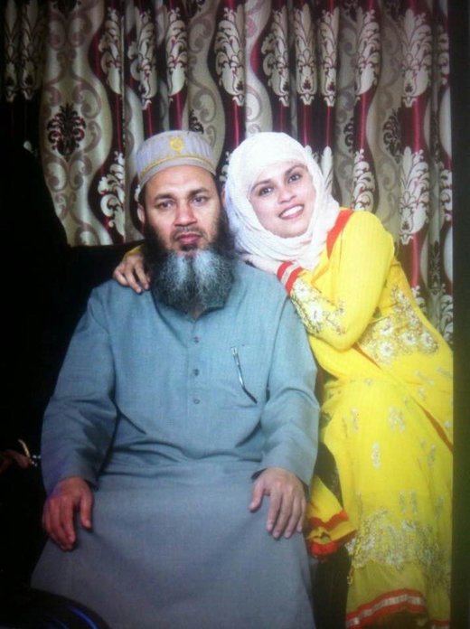 Click to enlarge Imam Alala Uddin Akongi and his eldest daughter, Musammot Akongi