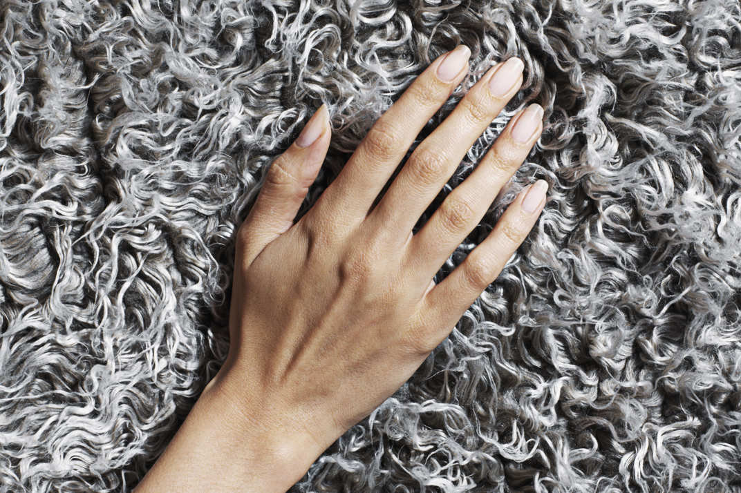 hand on fabric