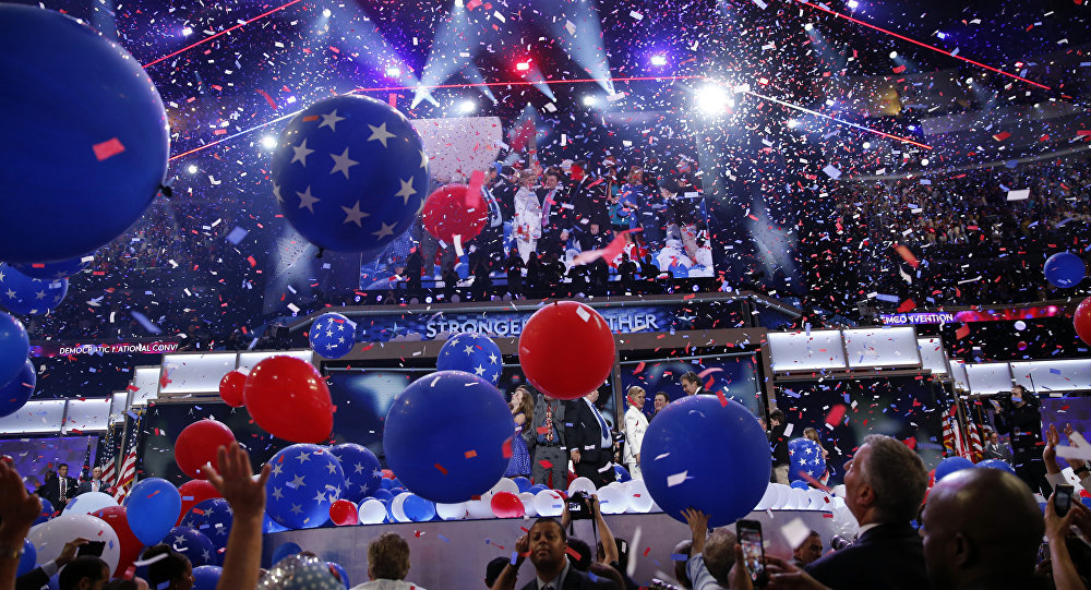 a photo of some stupid election campaign in the US with balloons and confetti