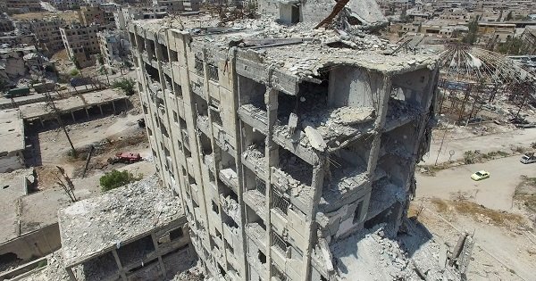 Click to enlarge A destroyed building in the Bani Zeid district in north Aleppo
