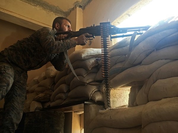 Click to enlarge Syrian army soldier during the assault