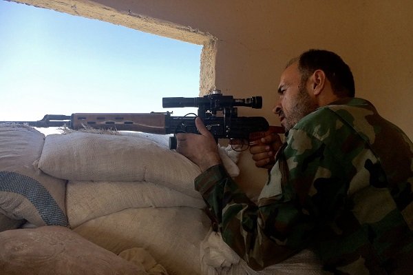 Click to enlarge Syrian army soldier during the assault