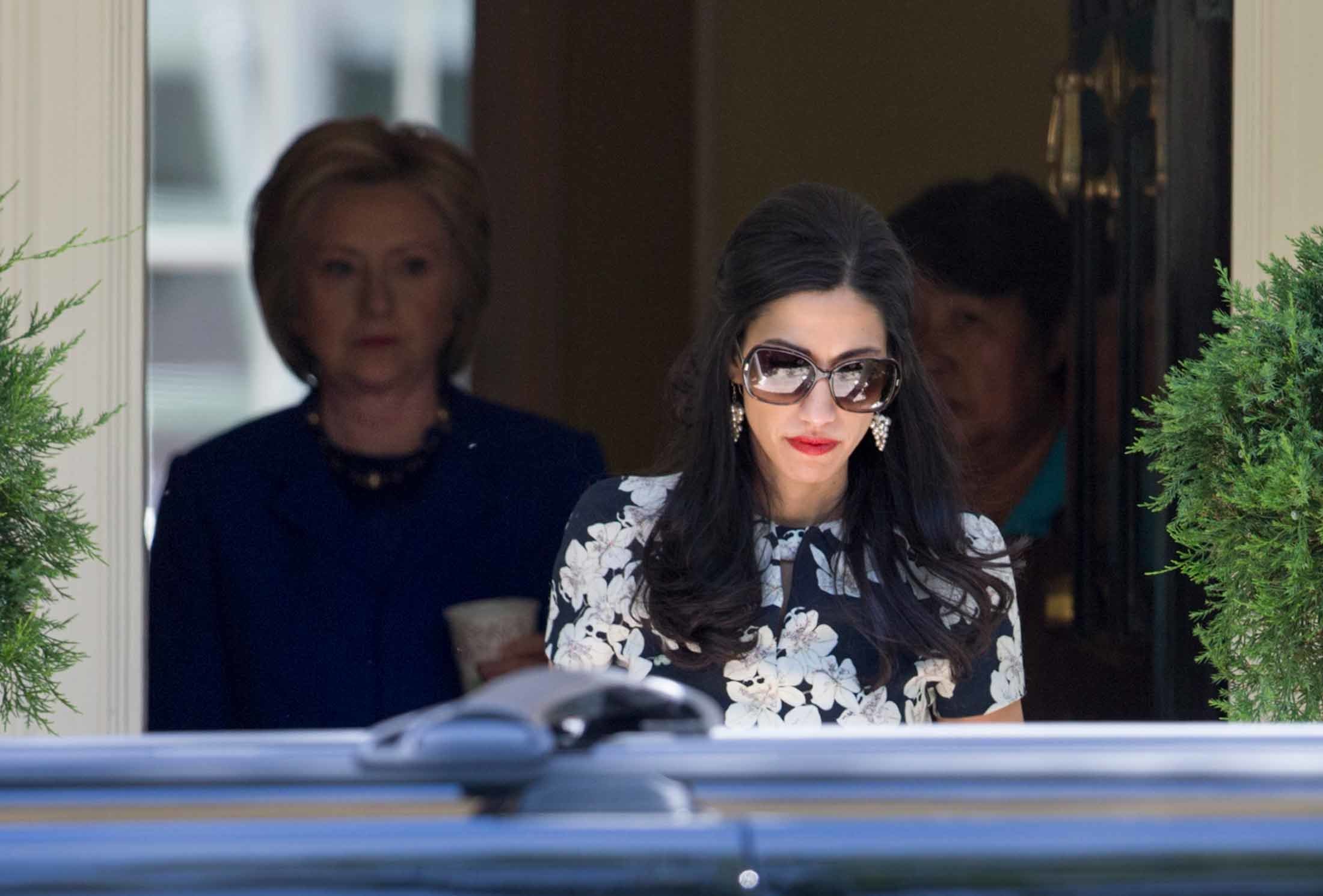 Click to enlarge Huma Abedin and Hillary Clinton