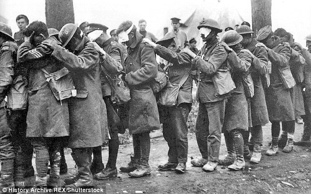 Click to enlarge British troops suffering the appalling effects of a German gas attack in 1918