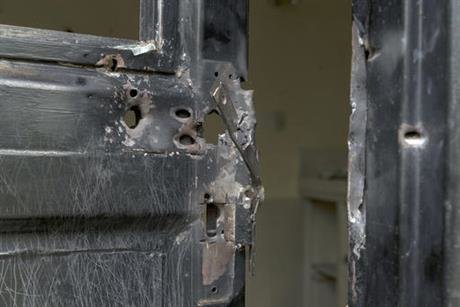 Click to enlarge Metal door shot open