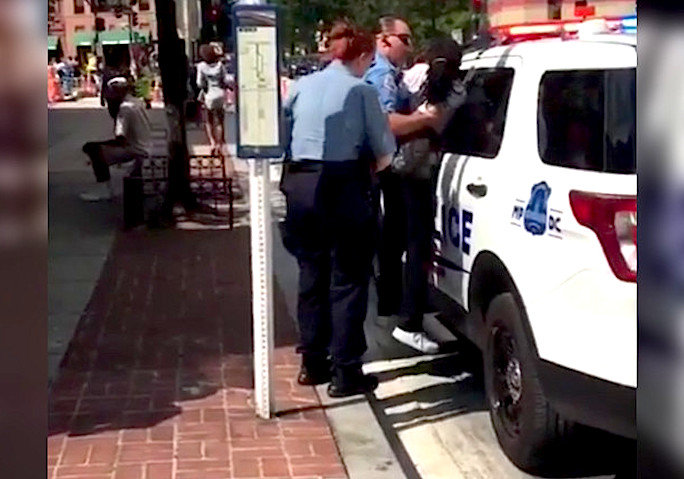 2 police dangle woman