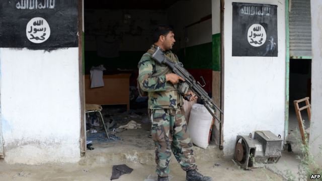 Click to enlarge Afghan security officer