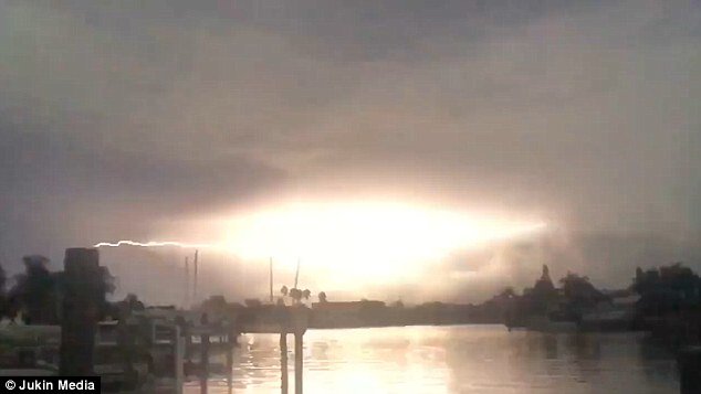 Click to enlarge After moving from right to left the bolt of lightning suddenly flashes brightly and illuminates the entire night sky