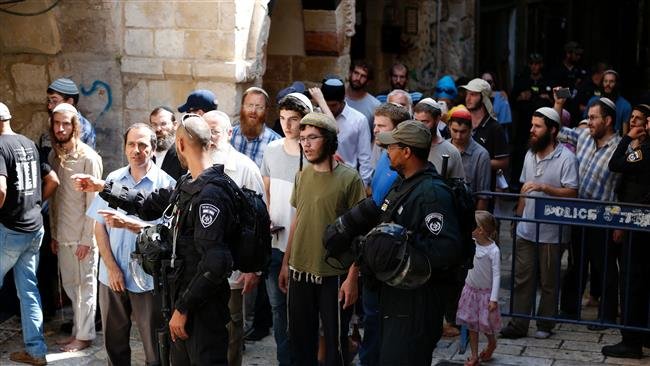 Click to enlarge Israeli forces stand guard