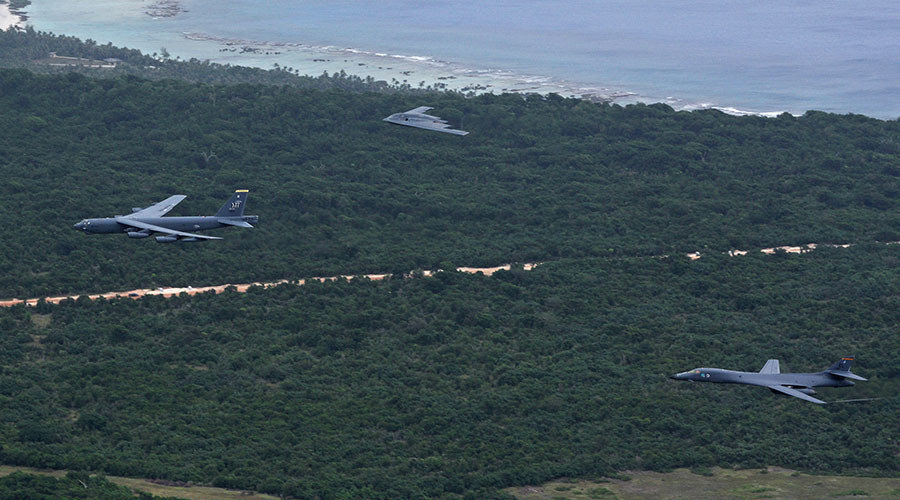 A US Air Force B-52 Stratofortress, B-1 Lancer and B-2 Spirit launch from Andersen Air Force Base, Guam