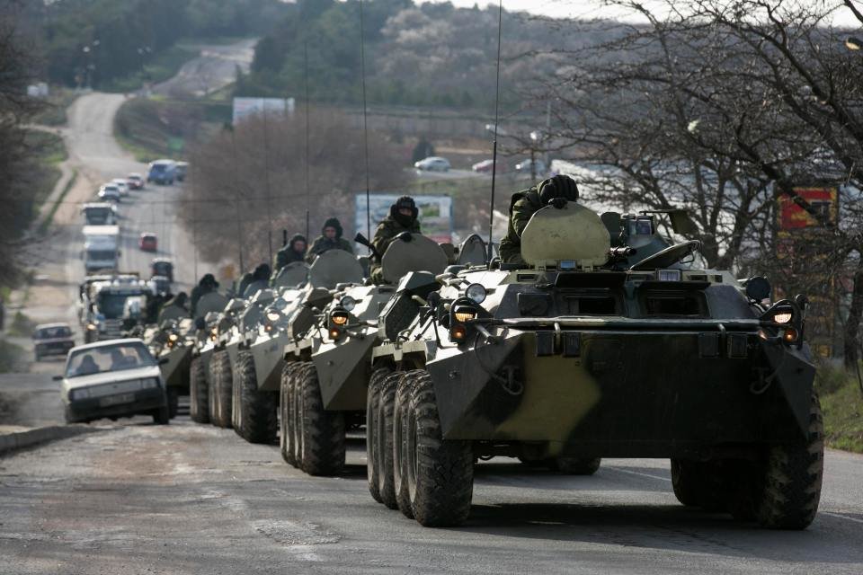 Russian armoured personnel carriers travel through the Crimea in 2014