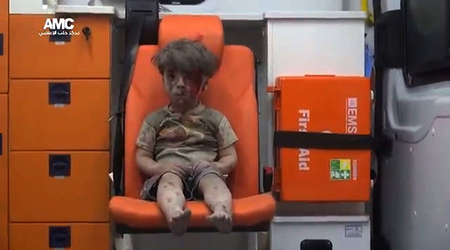 Click to enlarge boy bomb aleppo