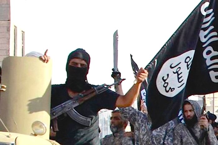 ISIS guy and flag