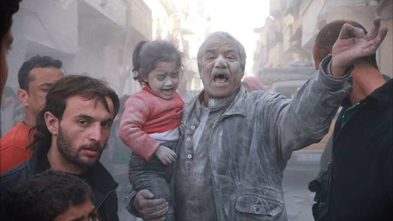 Click to enlarge Syrian people bombed