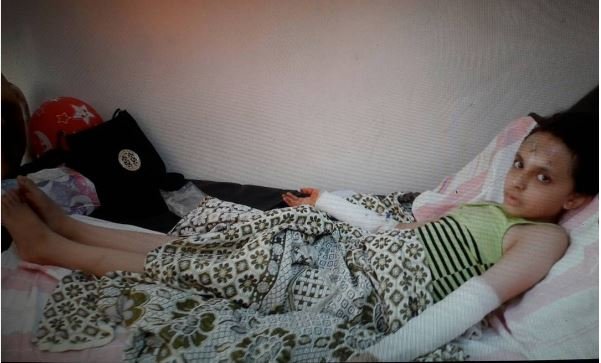 Click to enlarge child injured syria rebels