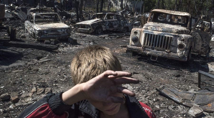 Burned cars in the village of Lozovoye in the Donetsk Region, as a result of shelling by Ukrainian forces