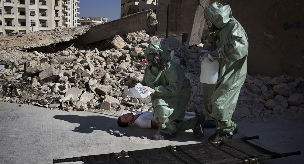 Click to enlarge Volunteers train to respond to chemical attacks
