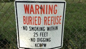 A warning sign around the old Kentwood Landfill.