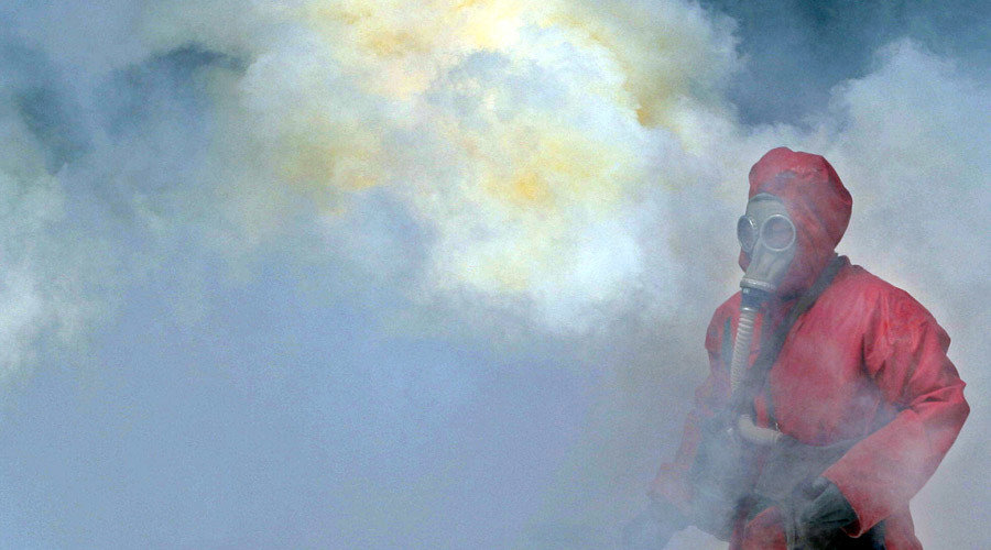 Person in hazmat suit in gas leak