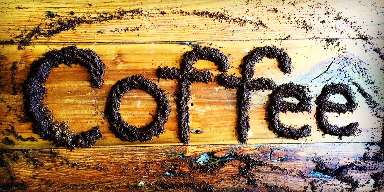 coffee spelled with coffee wood table
