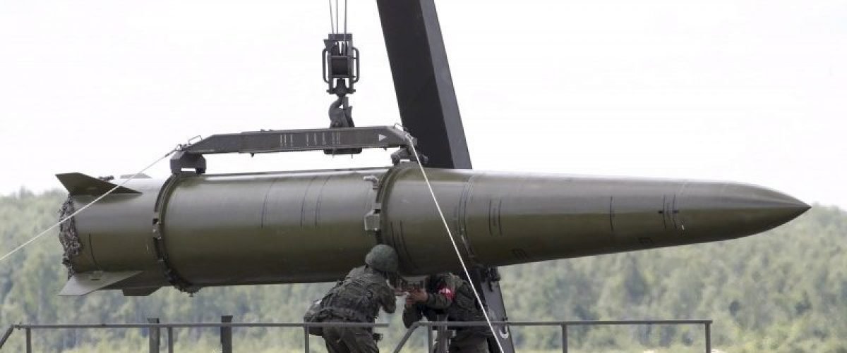 Russian servicemen equip an Iskander tactical missile system