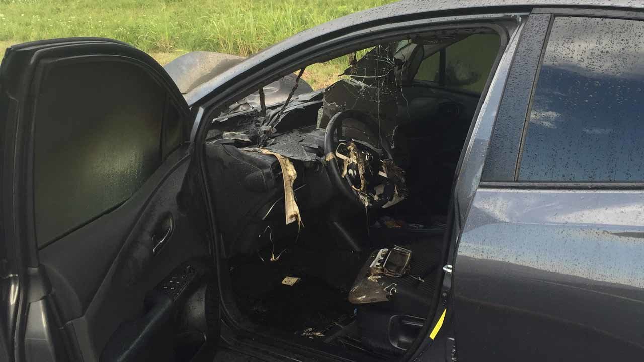 Click to enlarge Car hit by lightning