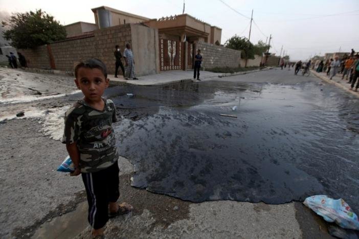 Click to enlarge oil spill from wells