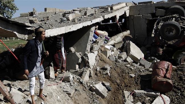 Yemenis check the destruction following an airstrike by Saudi warplanes in the capital, Sana’a, on September 4, 2016