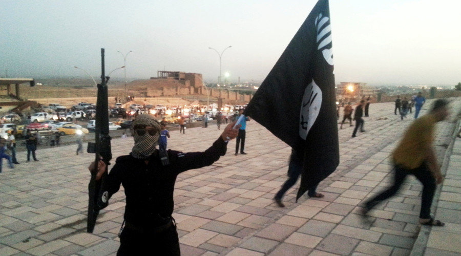ISIS militant with flag