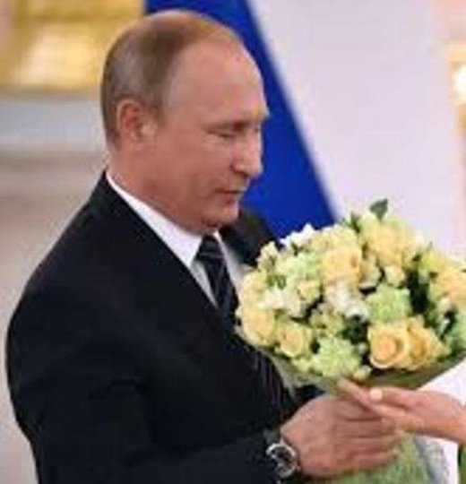 putin with flowers