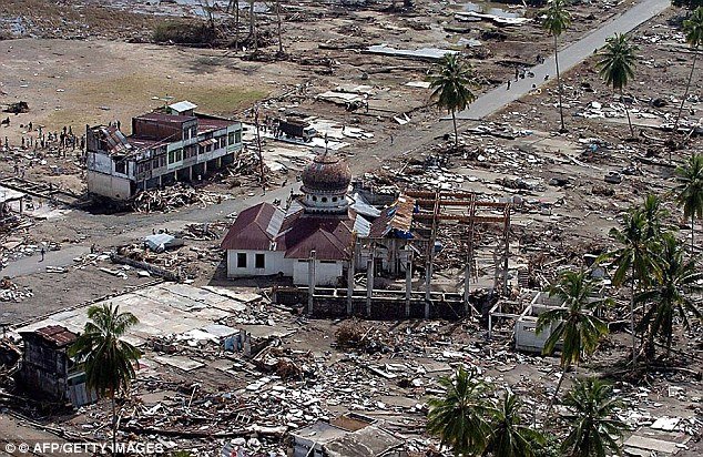 In one instance along the Sundra arc subduction zone, where the magnitude 9 Sumatra-Andaman mega-earthquake occurred off the coast of Indonesia in 2004 (aftermath pictured), a magnitude 7 quake triggered two large aftershocks over 124 miles (200 kilometre