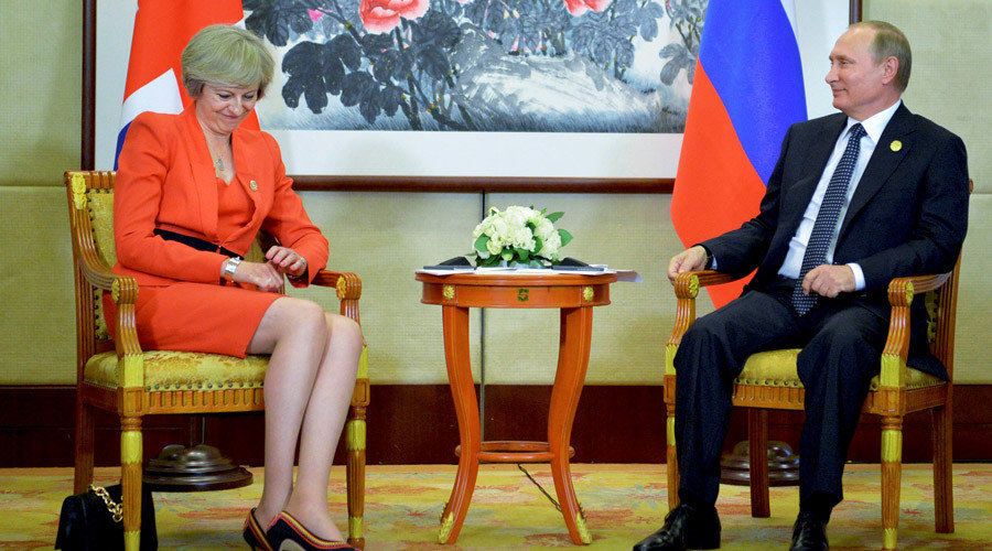 Russian President Vladimir Putin meets with British Prime Minister Theresa May