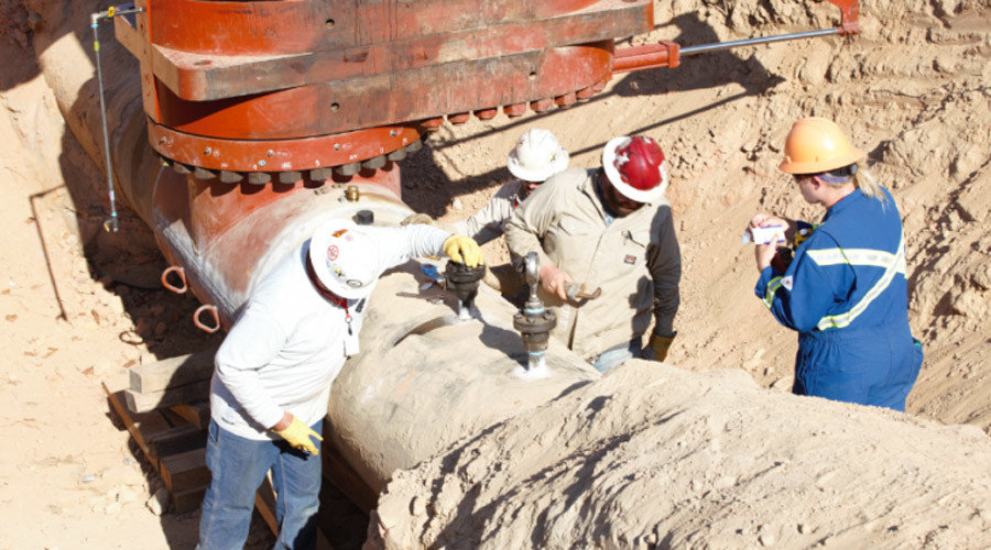 Response personnel working on the pipeline that spilled gasoline near Helena, Alabama