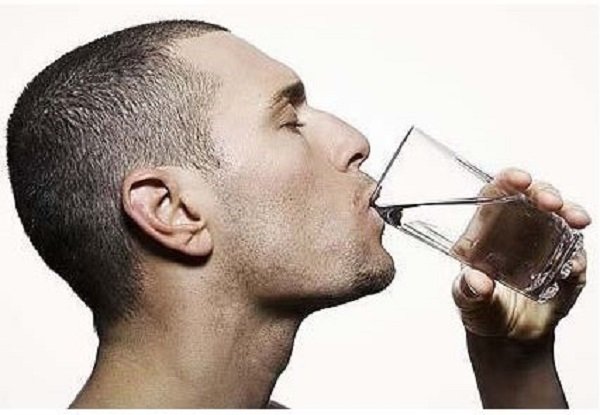 man drinking water