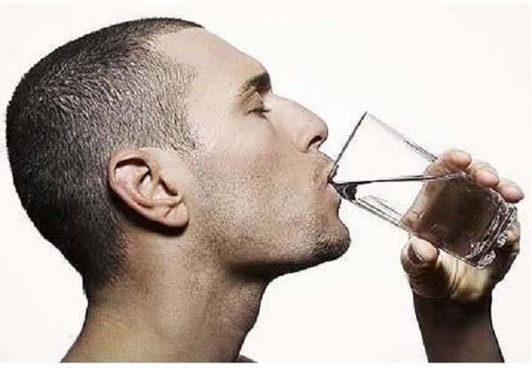 Click to enlarge man drinking water