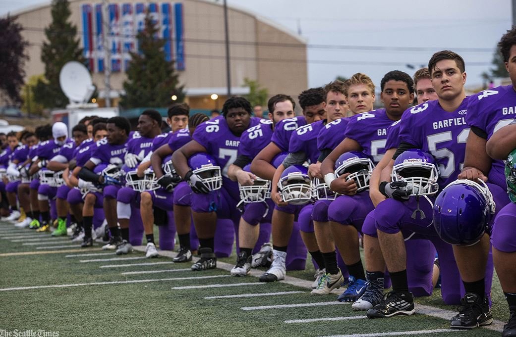 seattle football team kneels