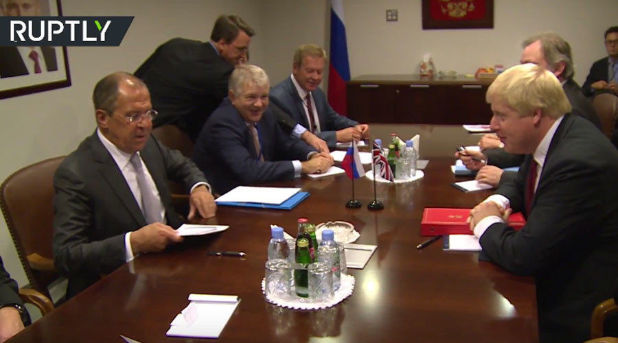 Click to enlarge Lavrov and British Foreign Secretary Boris Johnson