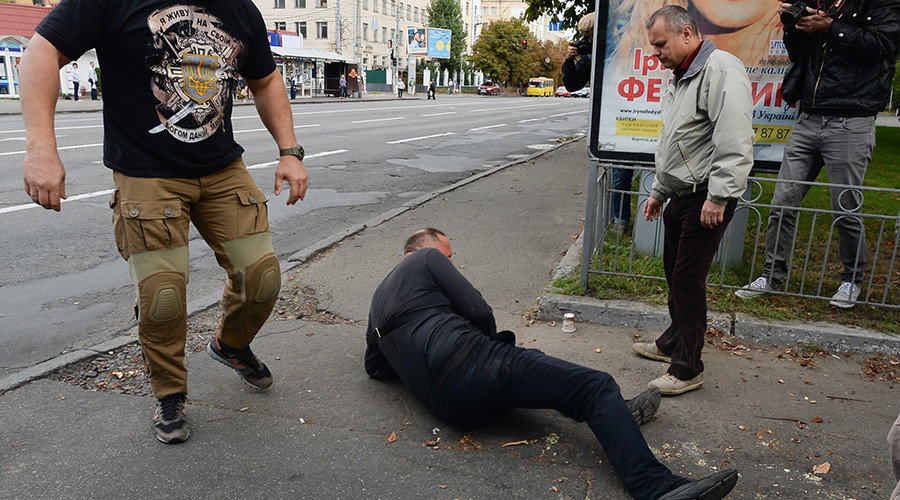 Click to enlarge Nationalist activists stage riots outside the Russian Embassy in Kiev