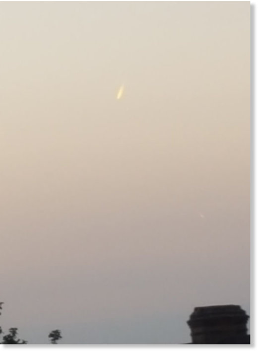 The UFO looked like a meteor or rocket, but was hovering in the sky 