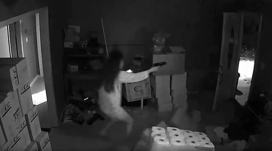 Click to enlarge Woman shooting robbers